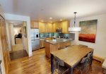 Each unit offers dining room table and breakfast bar seating